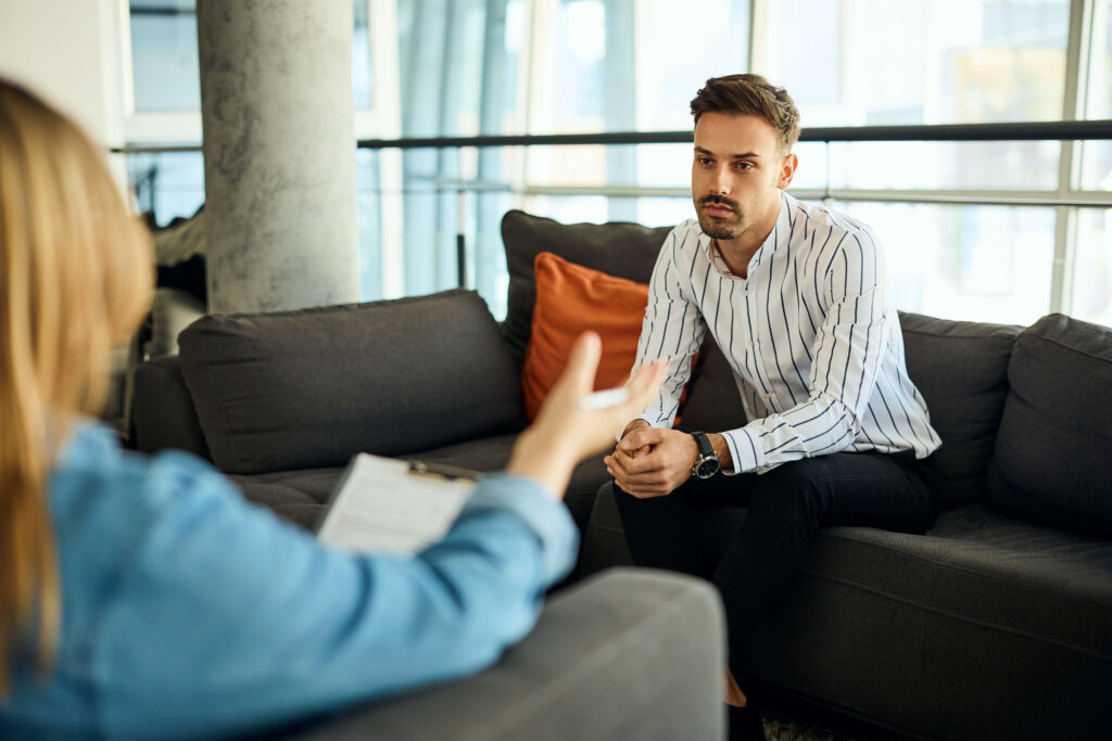 Professional Counseling Session in Modern Office Setting With Engaged Participants